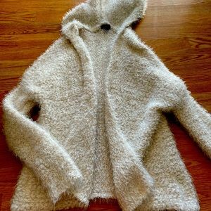 Cream colored fuzzy sweater with hood